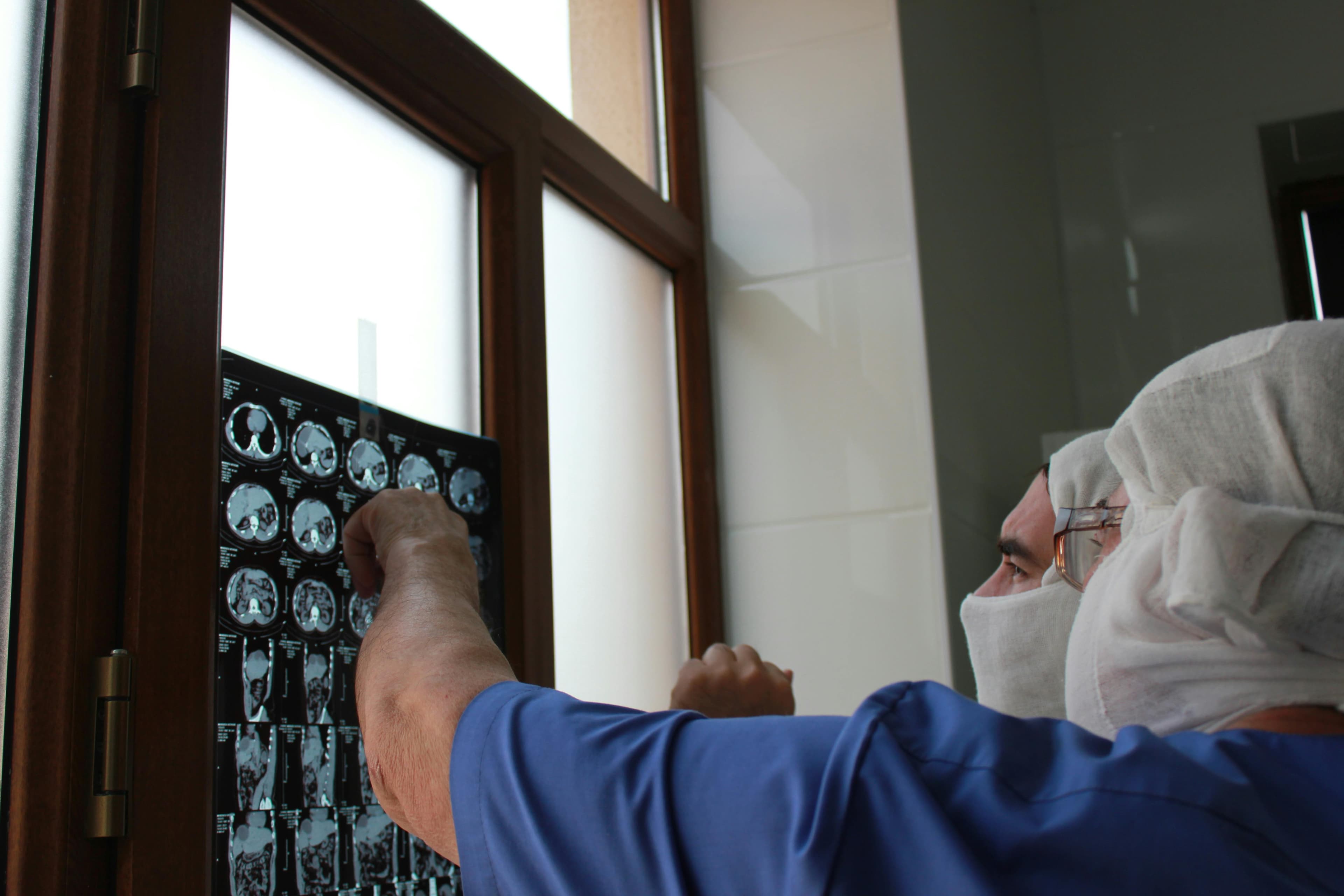 Physicians reviewing X-rays